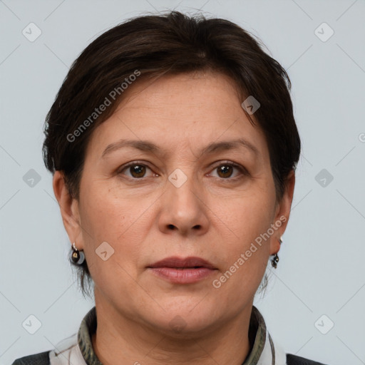 Joyful white adult female with short  brown hair and grey eyes