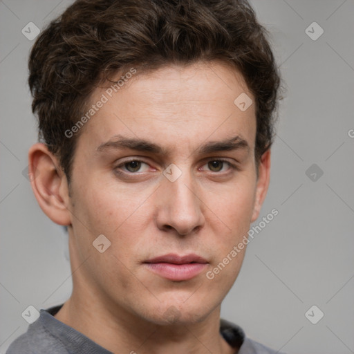 Neutral white young-adult male with short  brown hair and grey eyes