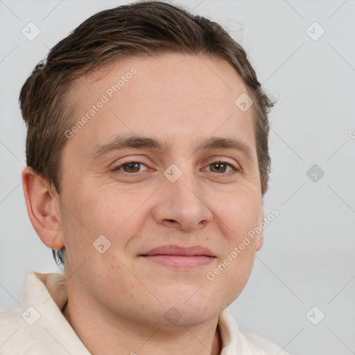 Joyful white adult male with short  brown hair and brown eyes