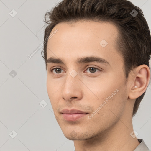 Neutral white young-adult male with short  brown hair and brown eyes