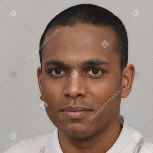 Neutral black young-adult male with short  black hair and brown eyes
