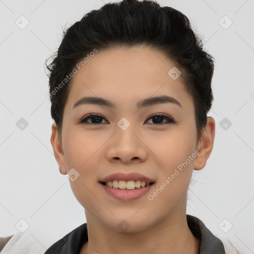 Joyful asian young-adult female with short  black hair and brown eyes