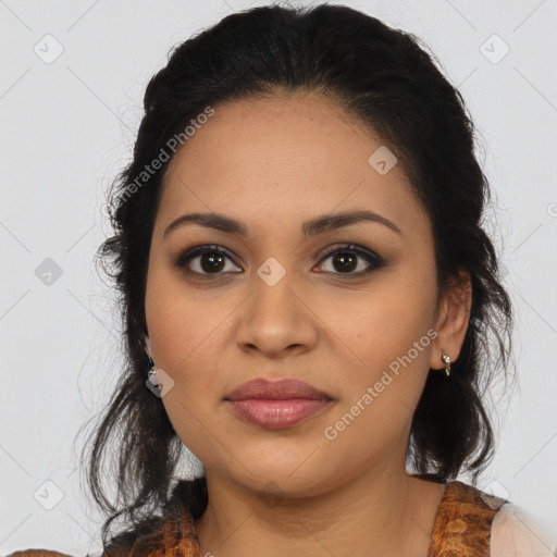 Joyful latino young-adult female with medium  brown hair and brown eyes