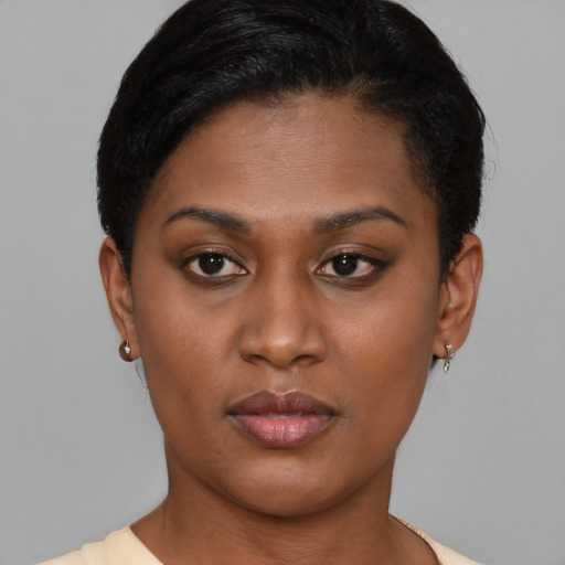 Neutral latino young-adult female with short  brown hair and brown eyes