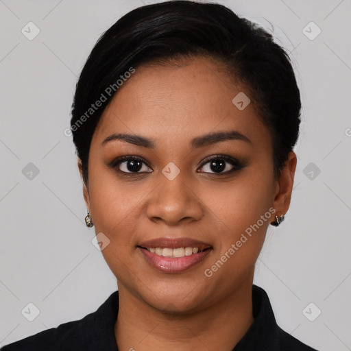 Joyful latino young-adult female with short  black hair and brown eyes