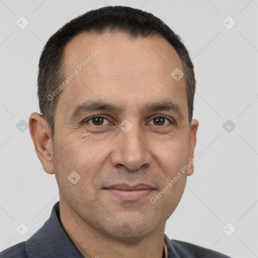 Joyful white adult male with short  brown hair and brown eyes