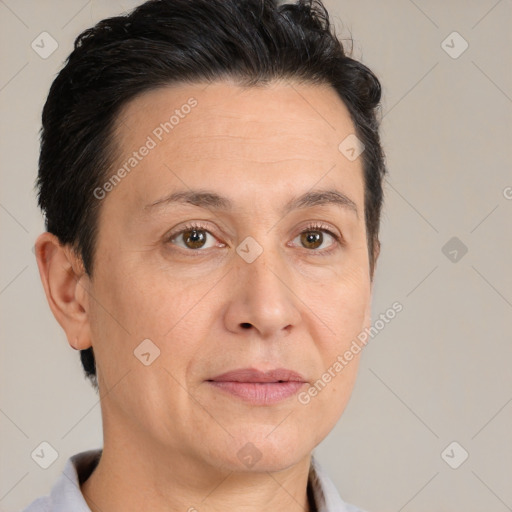 Joyful white adult female with short  brown hair and brown eyes