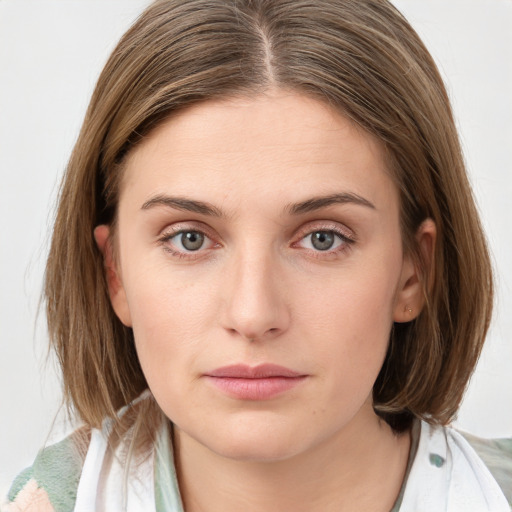 Neutral white young-adult female with medium  brown hair and grey eyes