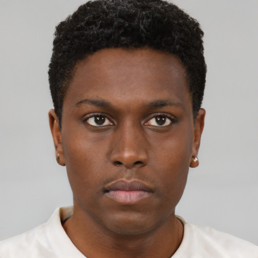 Neutral black young-adult male with short  brown hair and brown eyes