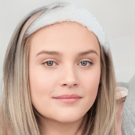 Neutral white young-adult female with long  brown hair and grey eyes