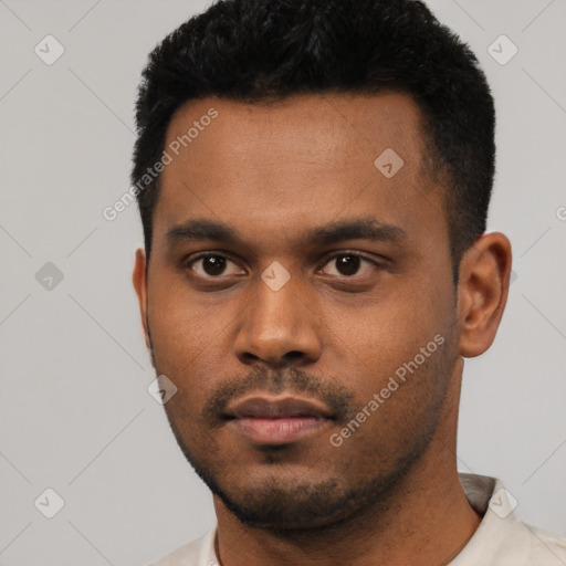 Neutral latino young-adult male with short  black hair and brown eyes