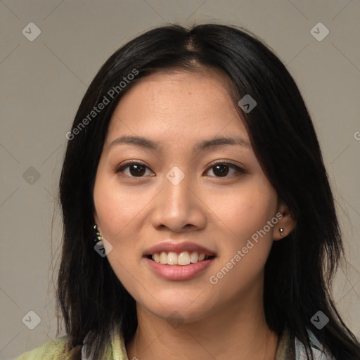 Joyful asian young-adult female with medium  brown hair and brown eyes