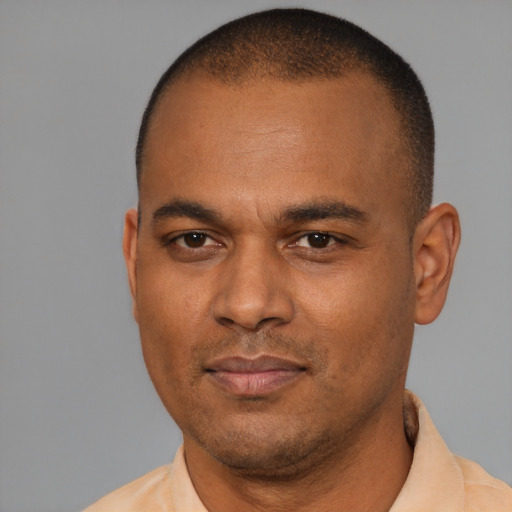 Neutral latino adult male with short  brown hair and brown eyes
