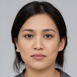 Neutral asian young-adult female with medium  black hair and brown eyes