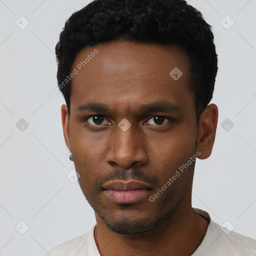 Neutral black young-adult male with short  black hair and brown eyes