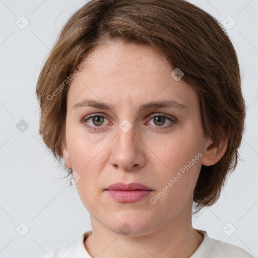 Neutral white young-adult female with medium  brown hair and green eyes