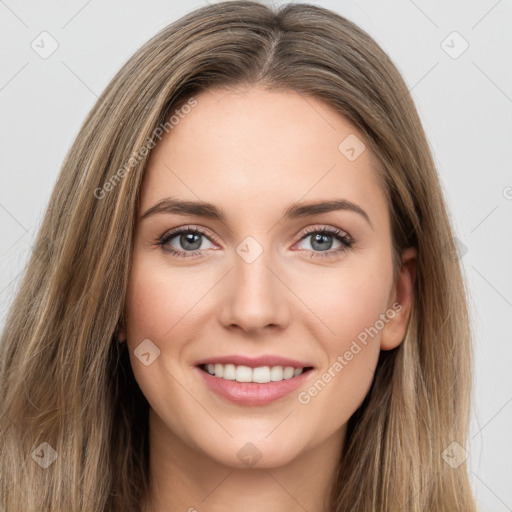 Joyful white young-adult female with long  brown hair and green eyes