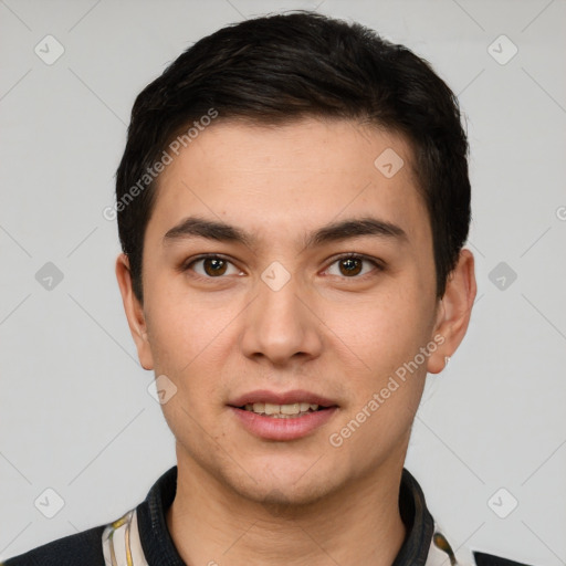 Joyful white young-adult male with short  black hair and brown eyes