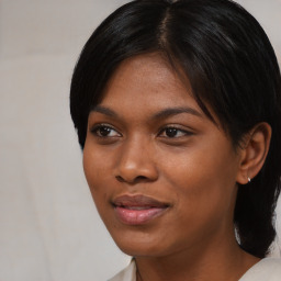 Joyful asian young-adult female with medium  black hair and brown eyes