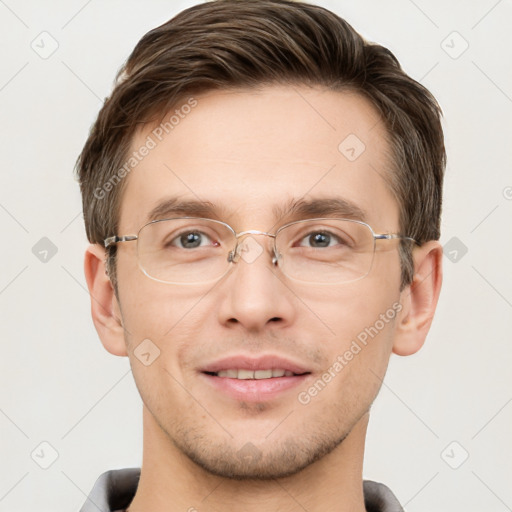 Joyful white adult male with short  brown hair and grey eyes