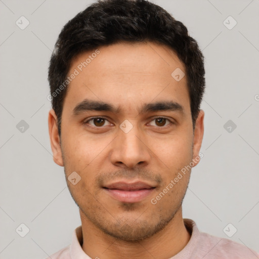 Neutral latino young-adult male with short  black hair and brown eyes