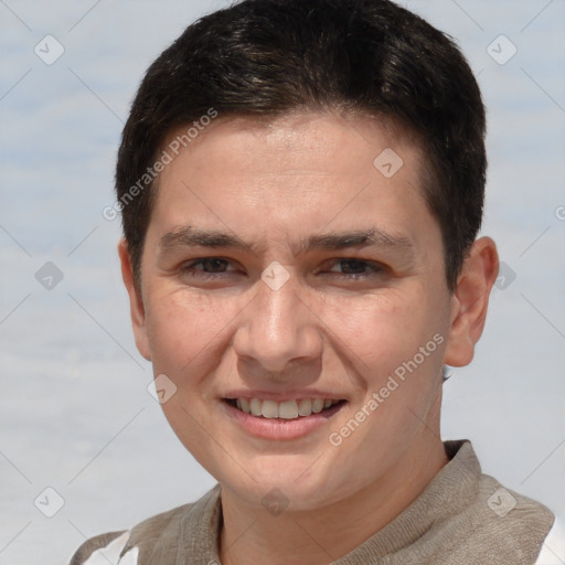 Joyful white adult male with short  brown hair and brown eyes