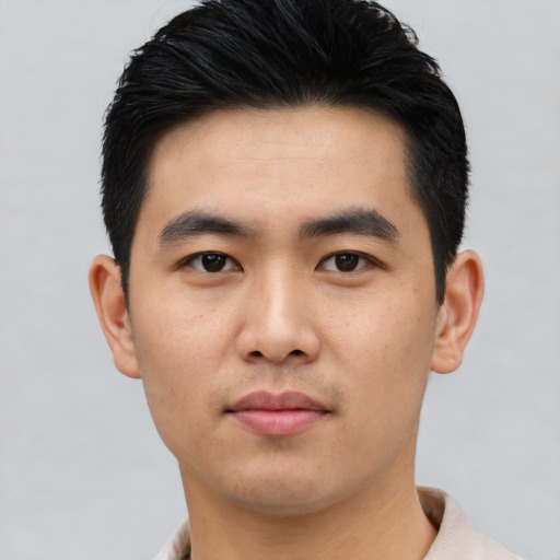 Neutral asian young-adult male with short  black hair and brown eyes