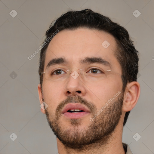 Neutral white young-adult male with short  black hair and brown eyes