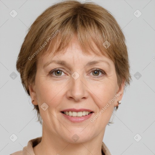 Joyful white adult female with medium  brown hair and grey eyes