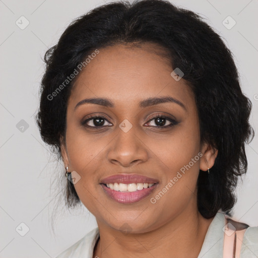 Joyful black young-adult female with medium  brown hair and brown eyes