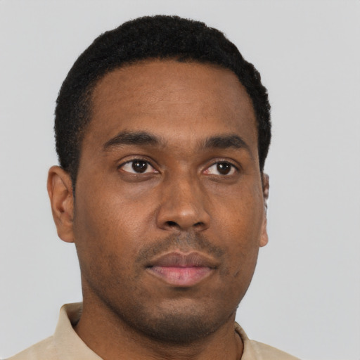 Neutral black young-adult male with short  brown hair and brown eyes