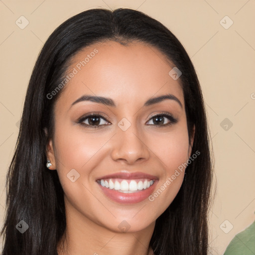 Joyful latino young-adult female with long  brown hair and brown eyes