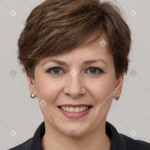 Joyful white young-adult female with short  brown hair and grey eyes