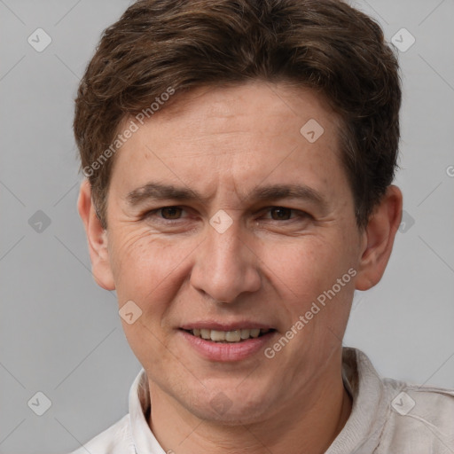 Joyful white adult male with short  brown hair and grey eyes