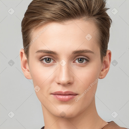 Joyful white young-adult female with short  brown hair and grey eyes