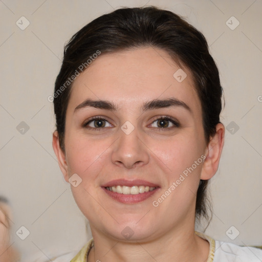 Joyful white young-adult female with medium  brown hair and brown eyes