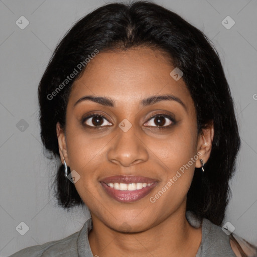 Joyful black young-adult female with medium  black hair and brown eyes