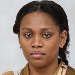 Neutral black young-adult female with short  brown hair and brown eyes