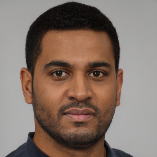 Neutral black young-adult male with short  black hair and brown eyes