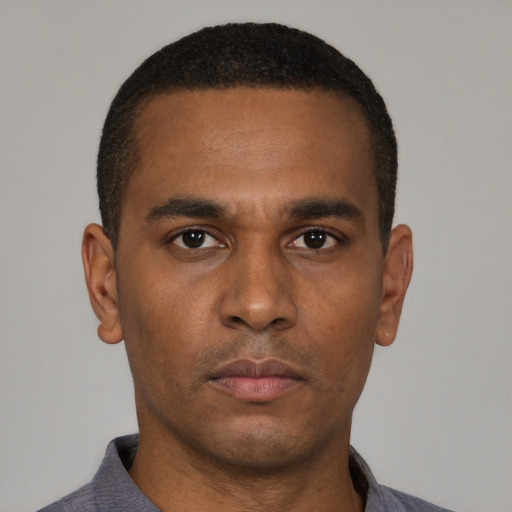 Neutral black young-adult male with short  black hair and brown eyes