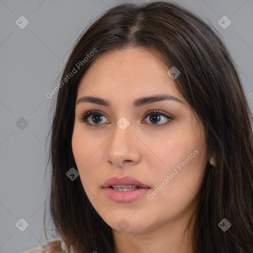 Neutral white young-adult female with long  brown hair and brown eyes