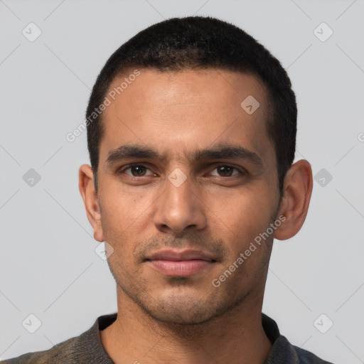 Neutral latino young-adult male with short  black hair and brown eyes