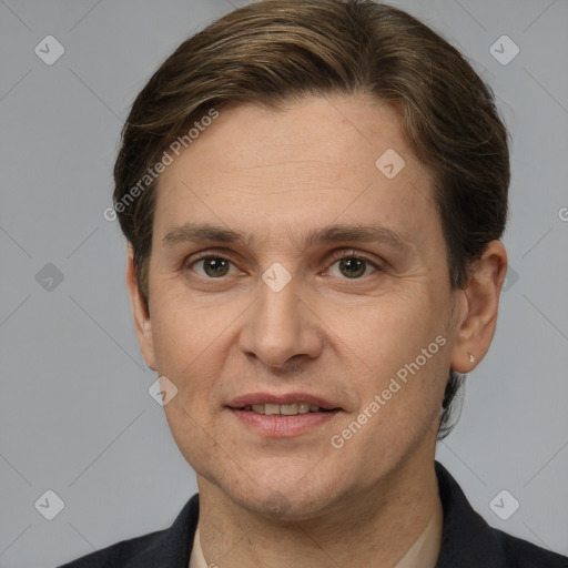 Joyful white adult male with short  brown hair and grey eyes