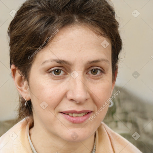 Joyful white adult female with short  brown hair and brown eyes