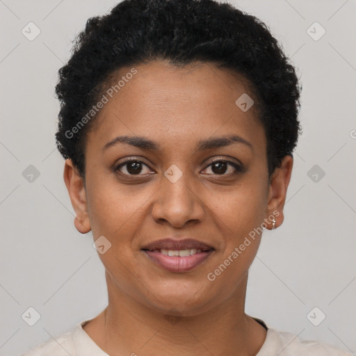 Joyful black young-adult female with short  black hair and brown eyes