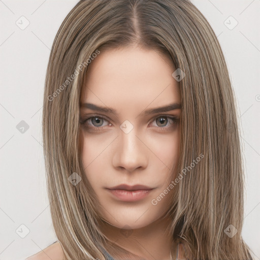 Neutral white young-adult female with long  brown hair and brown eyes