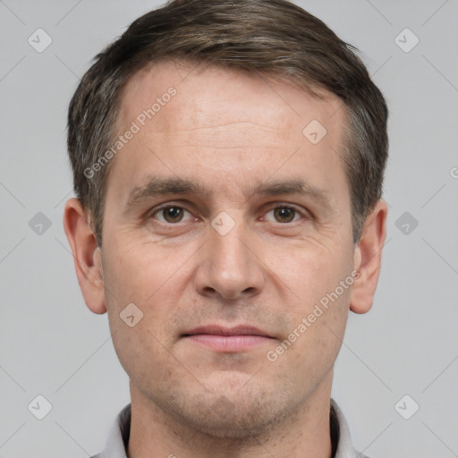 Neutral white adult male with short  brown hair and brown eyes