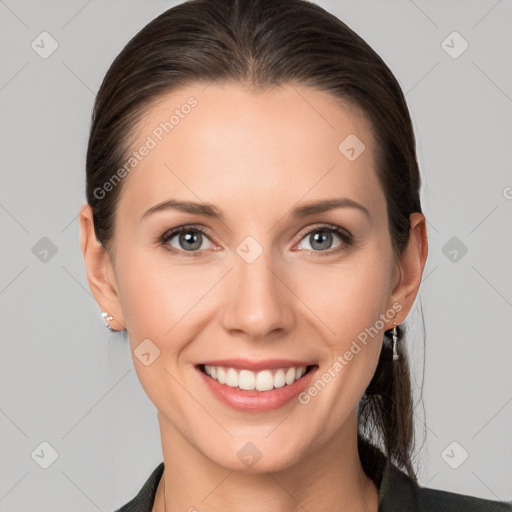 Joyful white young-adult female with medium  brown hair and grey eyes