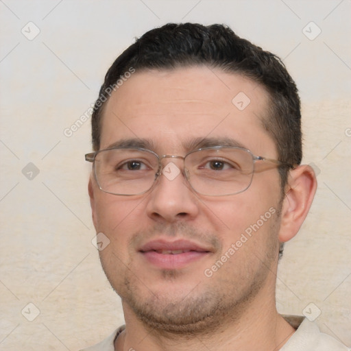 Joyful white adult male with short  brown hair and brown eyes