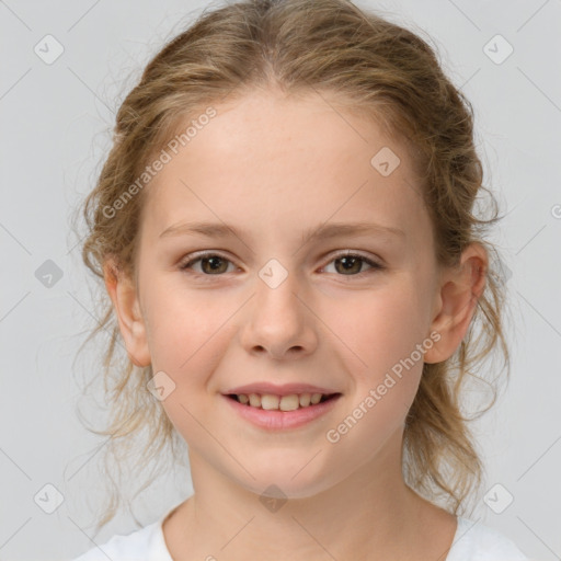 Joyful white child female with medium  brown hair and brown eyes